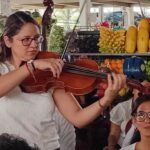Presentación de la Orquesta Filarmónica Municipal en el Mercado Florida Norte durante el programa Musimercados en Guayaquil.
